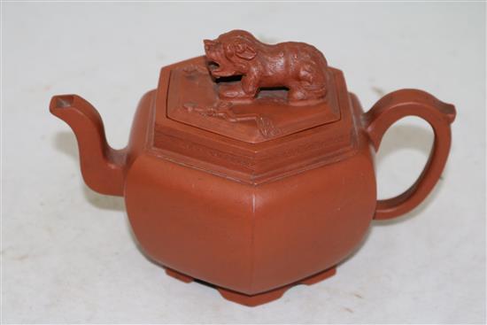 A Chinese Yixing hexagonal teapot and cover, 18th century, height 12.5cm, loss to sprig on cover